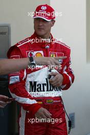 03.04.2005 Manama, Bahrain, Michael Schumacher, GER, Ferrari giving a press conference after stopping - Sunday, April, Formula 1 World Championship, Rd 3, Bahrain Grand Prix, BHR, Race