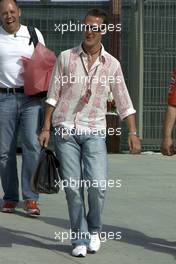 31.03.2005 Manama, Bahrain, Michael Schumacher, GER, Ferrari arrives at the circuit - Thursday, March, Formula 1 World Championship, Rd 3, Bahrain Grand Prix, BHR