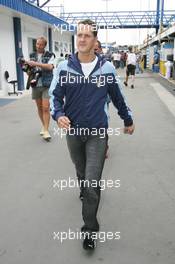 22.09.2005 Sao Paulo, Brazil,  Michael Schumacher, GER, Ferrari arrives at the circuit in a Italian football top - September, Formula 1 World Championship, Rd 17, Brazilian Grand Prix, Thursday