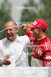 12.06.2005 Montreal, Canada,  Ron Dennis, GBR, McLaren, Teamchief, Chairman with Michael Schumacher, GER, Ferrari - June, Formula 1 World Championship, Rd 8, Canadian Grand Prix, Montreal, CDN, Podium