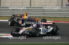 16.10.2005 Shanghai, China,  Jenson Button, GBR, Lucky Strike BAR Honda 007, Action, Track leads David Coulthard, GBR, Red Bull Racing, RB1, Action, Track - October, Formula 1 World Championship, Rd 19, Chinese Grand Prix, Sunday Race