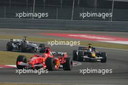 16.10.2005 Shanghai, China,  Michael Schumacher, GER, Scuderia Ferrari Marlboro, F2005, Action, Track leads Christian Klien, AUT, Red Bull Racing, RB1, Action, Track - October, Formula 1 World Championship, Rd 19, Chinese Grand Prix, Sunday Race