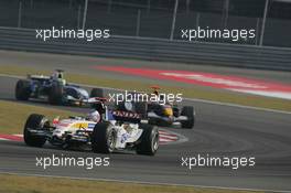 16.10.2005 Shanghai, China,  Jenson Button, GBR, Lucky Strike BAR Honda 007, Action, Track leads David Coulthard, GBR, Red Bull Racing, RB1, Action, Track - October, Formula 1 World Championship, Rd 19, Chinese Grand Prix, Sunday Race