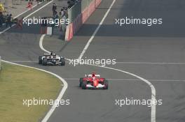 16.10.2005 Shanghai, China,  Michael Schumacher, GER, Scuderia Ferrari Marlboro, F2005, Action, Track leads Christijan Albers, NED, Minardi Cosworth, Action, Track who started the race from the pit lane - October, Formula 1 World Championship, Rd 19, Chinese Grand Prix, Sunday Race