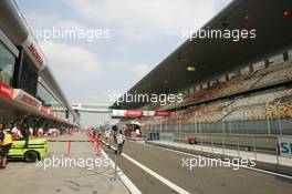 13.10.2005 Shanghai, China,  The pit lane - October, Formula 1 World Championship, Rd 19, Chinese Grand Prix, Thursday