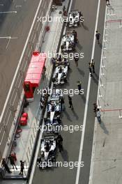 13.10.2005 Shanghai, China,  The cars wait for scrutineering - October, Formula 1 World Championship, Rd 19, Chinese Grand Prix, Thursday