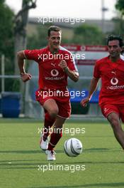 05.05.2005 Barcelona, Spain, Football at Campo de Deportes Municipal de Montmelo - with Michael Schumacher, GER, Ferrari - May, Formula 1 World Championship, Rd 5, Spanish Grand Prix, ESP