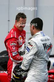 29.05.2005 Nuerburg, Germany,  Michael Schumacher (GER), Scuderia Ferrari Marlboro, Portrait (left), and Juan-Pablo Montoya (COL), West McLaren Mercedes (right), in the Parc Ferme after the race - May, Formula 1 World Championship, Rd 7, European Grand Prix, Nürburgring, GER, Podium