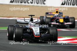 01.07.2005 Magny-Cours, France,  Juan-Pablo Montoya (COL), West McLaren Mercedes MP4-20, in front of David Coulthard (GBR), Red Bull Racing RB1 - July, Formula 1 World Championship, Rd 10, French Grand Prix, Magny Cours, France, Practice