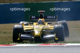 01.07.2005 Magny-Cours, France,  Tiago Monteiro (POR), Jordan Toyota EJ15, with a broken rear left suspension after flying over the curbe stones- July, Formula 1 World Championship, Rd 10, French Grand Prix, Magny Cours, France, Practice