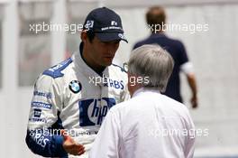 01.07.2005 Magny-Cours, France,  Mark Webber (AUS), BMW Williams F1 Team, Portrait, talking with Bernie Ecclestone (GBR), CEO of Formula One Management (FOM) - July, Formula 1 World Championship, Rd 10, French Grand Prix, Magny Cours, France