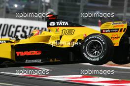 01.07.2005 Magny-Cours, France,  Tiago Monteiro (POR), Jordan Toyota EJ15, flying over the curbe stones - July, Formula 1 World Championship, Rd 10, French Grand Prix, Magny Cours, France, Practice