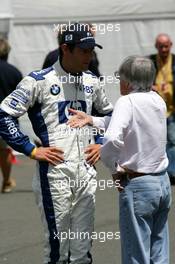 01.07.2005 Magny-Cours, France,  Bernie Ecclestone (GBR), CEO of Formula One Management (FOM) (right), talking with Mark Webber (AUS), BMW Williams F1 Team, Portrait (left) - July, Formula 1 World Championship, Rd 10, French Grand Prix, Magny Cours, France