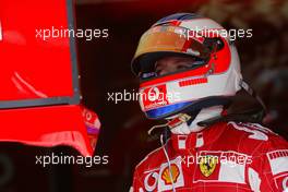 01.07.2005 Magny-Cours, France,  Rubens Barrichello (BRA), Scuderia Ferrari Marlboro, Portrait, checking out the laptimes on a monitor - July, Formula 1 World Championship, Rd 10, French Grand Prix, Magny Cours, France, Practice