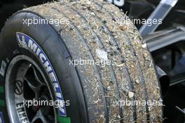 01.07.2005 Magny-Cours, France,  Gras and stones on the tyres of Kimi Raikkonen (FIN), West McLaren Mercedes MP4-20, after stopping on the track - July, Formula 1 World Championship, Rd 10, French Grand Prix, Magny Cours, France, Practice