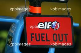 01.07.2005 Magny-Cours, France,  Elf FUEL OUT sign to indicate the fuel has been taken out of the car - July, Formula 1 World Championship, Rd 10, French Grand Prix, Magny Cours, France, Practice