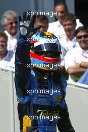 03.07.2005 Magny-Cours, France,  Fernando Alonso, ESP, Renault F1 Team - July, Formula 1 World Championship, Rd 10, French Grand Prix, Magny Cours, France, Podium