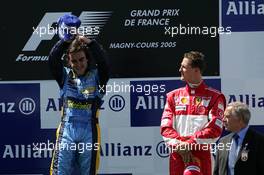 03.07.2005 Magny-Cours, France,  Fernando Alonso, ESP, Renault F1 Team and Michael Schumacher, GER, Ferrari - July, Formula 1 World Championship, Rd 10, French Grand Prix, Magny Cours, France, Podium