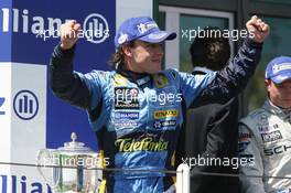 03.07.2005 Magny-Cours, France,  Fernando Alonso, ESP, Renault F1 Team - July, Formula 1 World Championship, Rd 10, French Grand Prix, Magny Cours, France, Podium
