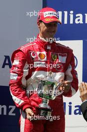 03.07.2005 Magny-Cours, France,  Michael Schumacher, GER, Ferrari - July, Formula 1 World Championship, Rd 10, French Grand Prix, Magny Cours, France, Podium