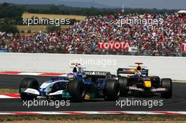 03.07.2005 Magny-Cours, France,  Jacques Villeneuve (CAN), Sauber Petronas C24, leads David Coulthard (GBR), Red Bull Racing RB1 - July, Formula 1 World Championship, Rd 10, French Grand Prix, Magny Cours, France, Race