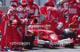 03.07.2005 Magny-Cours, France,  Michael Schumacher, GER, Ferrari pit stop - July, Formula 1 World Championship, Rd 10, French Grand Prix, Magny Cours, France, Race
