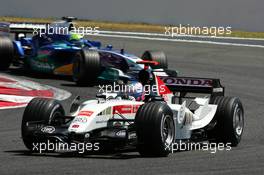 03.07.2005 Magny-Cours, France,  Jenson Button (GBR), Lucky Strike BAR Honda 007, leads Felipe Massa (BRA), Sauber Petronas C24 - July, Formula 1 World Championship, Rd 10, French Grand Prix, Magny Cours, France, Race
