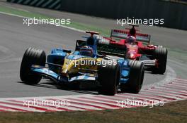 03.07.2005 Magny-Cours, France,  Fernando Alonso, ESP, Mild Seven Renault F1 Team, R25, Action, Track - July, Formula 1 World Championship, Rd 10, French Grand Prix, Magny Cours, France, Race