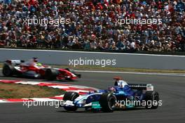 03.07.2005 Magny-Cours, France,  Jacques Villeneuve (CAN), Sauber Petronas C24, leads Ralf Schumacher (GER), Panasonic Toyota Racing TF105 - July, Formula 1 World Championship, Rd 10, French Grand Prix, Magny Cours, France, Race