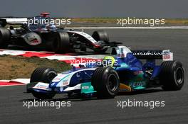 03.07.2005 Magny-Cours, France,  Felipe Massa (BRA), Sauber Petronas C24, leads Kimi Raikkonen (FIN), West McLaren Mercedes MP4-20 - July, Formula 1 World Championship, Rd 10, French Grand Prix, Magny Cours, France, Race