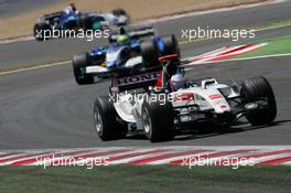 03.07.2005 Magny-Cours, France,  Jenson Button, GBR, Lucky Strike BAR Honda 007, Action, Track leads Felipe Massa, BRA, Sauber Petronas C24, Track, Action - July, Formula 1 World Championship, Rd 10, French Grand Prix, Magny Cours, France, Race