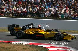 03.07.2005 Magny-Cours, France,  Tiago Monteiro (POR), Jordan Toyota EJ15, overtakes Christijan Albers (NED), Minardi Cosworth PS05 - July, Formula 1 World Championship, Rd 10, French Grand Prix, Magny Cours, France, Race