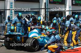 03.07.2005 Magny-Cours, France,  Fernando Alonso, ESP, Renault F1 Team pit stop - July, Formula 1 World Championship, Rd 10, French Grand Prix, Magny Cours, France, Race