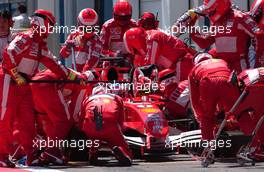 03.07.2005 Magny-Cours, France,  Rubens Barrichello, BRA, Ferrari pit stop - July, Formula 1 World Championship, Rd 10, French Grand Prix, Magny Cours, France, Race