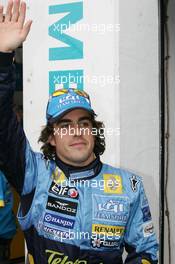02.07.2005 Magny-Cours, France,  Fernando Alonso, ESP, Renault F1 Team celebrates pole position - July, Formula 1 World Championship, Rd 10, French Grand Prix, Magny Cours, France, Qualifying