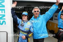 02.07.2005 Magny-Cours, France,  Fernando Alonso, ESP, Renault F1 Team and Flavio Briatore, ITA, Renault, Teamchief, Managing Director celebrate pole position - July, Formula 1 World Championship, Rd 10, French Grand Prix, Magny Cours, France, Qualifying
