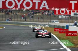 02.07.2005 Magny-Cours, France,  Jarno Trulli (ITA), Panasonic Toyota Racing TF105, in front of Ralf Schumacher (GER), Panasonic Toyota Racing TF105 - July, Formula 1 World Championship, Rd 10, French Grand Prix, Magny Cours, France, Practice