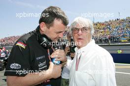 03.07.2005 Magny-Cours, France,  Bernie Ecclestone, GBR talks with Paul Stoddart, AUS, Minardi, Teamchief, President & CEO - July, Formula 1 World Championship, Rd 10, French Grand Prix, Magny Cours, France