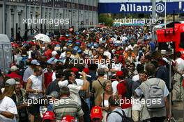 30.06.2005 Magny-Cours, France,  The pitlane filled with fans during the pitwalk on Thursday afternoon - June, Formula 1 World Championship, Rd 10, French Grand Prix, Magny Cours, France