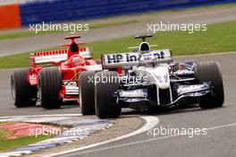 08.07.2005 Silverstone, England, Nick Heidfeld (GER), BMW Williams F1 FW27, in front of Michael Schumacher (GER), Scuderia Ferrari Marlboro F2005 - July, Formula 1 World Championship, Rd 11, British Grand Prix, Silverstone, England, Practice