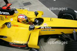 08.07.2005 Silverstone, England, Tiago Monteiro (POR), Jordan Toyota EJ15, driving out of the pitbox - July, Formula 1 World Championship, Rd 11, British Grand Prix, Silverstone, England, Practice
