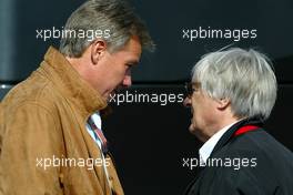 08.07.2005 Silverstone, England, Bernie Ecclestone, GBR talks with Craig Pollock, Jacques Villeneuve's manager - July, Formula 1 World Championship, Rd 11, British Grand Prix, Silverstone, England