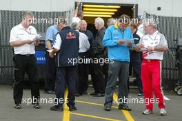 08.07.2005 Silverstone, England, The teams read through papers after a meeting - July, Formula 1 World Championship, Rd 11, British Grand Prix, Silverstone, England