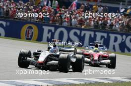 10.07.2005 Silverstone, England, Kimi Raikkonen, FIN, Räikkönen, West McLaren Mercedes, MP4-20, Action, Track leads Ralf Schumacher, GER, Panasonic Toyota Racing, TF105, Action, Track - July, Formula 1 World Championship, Rd 11, British Grand Prix, Silverstone, England, Race