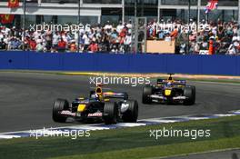 10.07.2005 Silverstone, England, David Coulthard (GBR), Red Bull Racing RB1, leads Christian Klien (AUT), Red Bull Racing RB1 - July, Formula 1 World Championship, Rd 11, British Grand Prix, Silverstone, England, Race