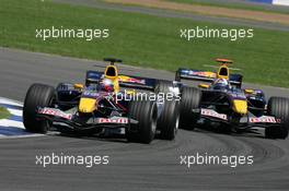 10.07.2005 Silverstone, England, Christian Klien, AUT, Red Bull Racing, RB1, Action, Track and David Coulthard, GBR, Red Bull Racing, RB1, Action, Track - July, Formula 1 World Championship, Rd 11, British Grand Prix, Silverstone, England, Race