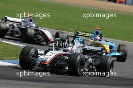 10.07.2005 Silverstone, England, Juan-Pablo Montoya, COL, Juan Pablo, West McLaren Mercedes, MP4-20, Action, Track leads Fernando Alonso, ESP, Mild Seven Renault F1 Team, R25, Action, Track and Kimi Raikkonen, FIN, Räikkönen, West McLaren Mercedes, MP4-20, Action, Track - July, Formula 1 World Championship, Rd 11, British Grand Prix, Silverstone, England, Race