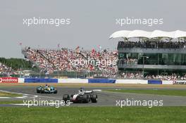 10.07.2005 Silverstone, England, Kimi Raikkonen, FIN, Räikkönen, West McLaren Mercedes, MP4-20, Action, Track leads Fernando Alonso, ESP, Mild Seven Renault F1 Team, R25, Action, Track - July, Formula 1 World Championship, Rd 11, British Grand Prix, Silverstone, England, Race