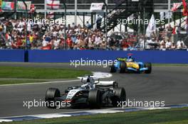 10.07.2005 Silverstone, England, Juan-Pablo Montoya (COL), West McLaren Mercedes MP4-20, leading the race in front of Fernando Alonso (ESP), Mild Seven Renault F1 R25 - July, Formula 1 World Championship, Rd 11, British Grand Prix, Silverstone, England, Race