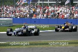 10.07.2005 Silverstone, England, Mark Webber (AUS), BMW Williams F1 FW27, leads Christian Klien (AUT), Red Bull Racing RB1 - July, Formula 1 World Championship, Rd 11, British Grand Prix, Silverstone, England, Race